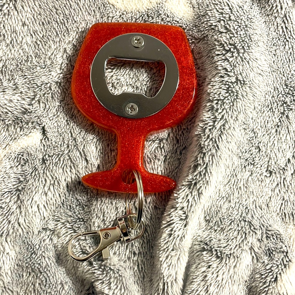 Bottle opener with keychain